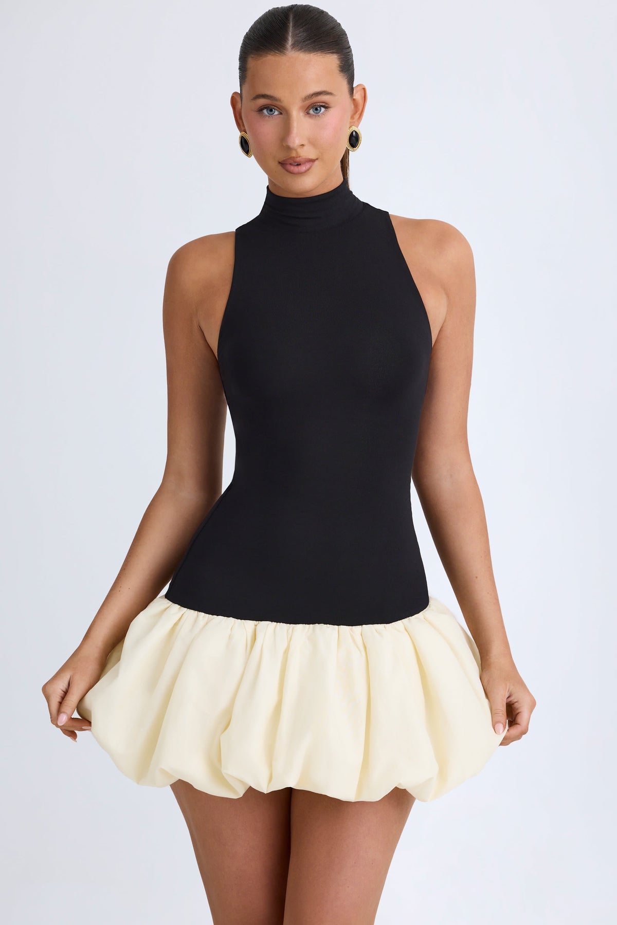 Turtleneck Drop-Waist Bubble Hem Mini Dress in Black